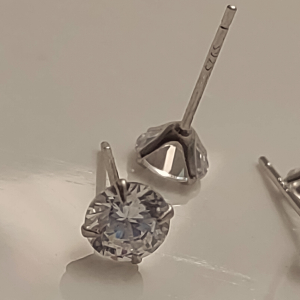 - Diamond stud earrings three-piece set 90, 70 and 40 9-25 Sterling